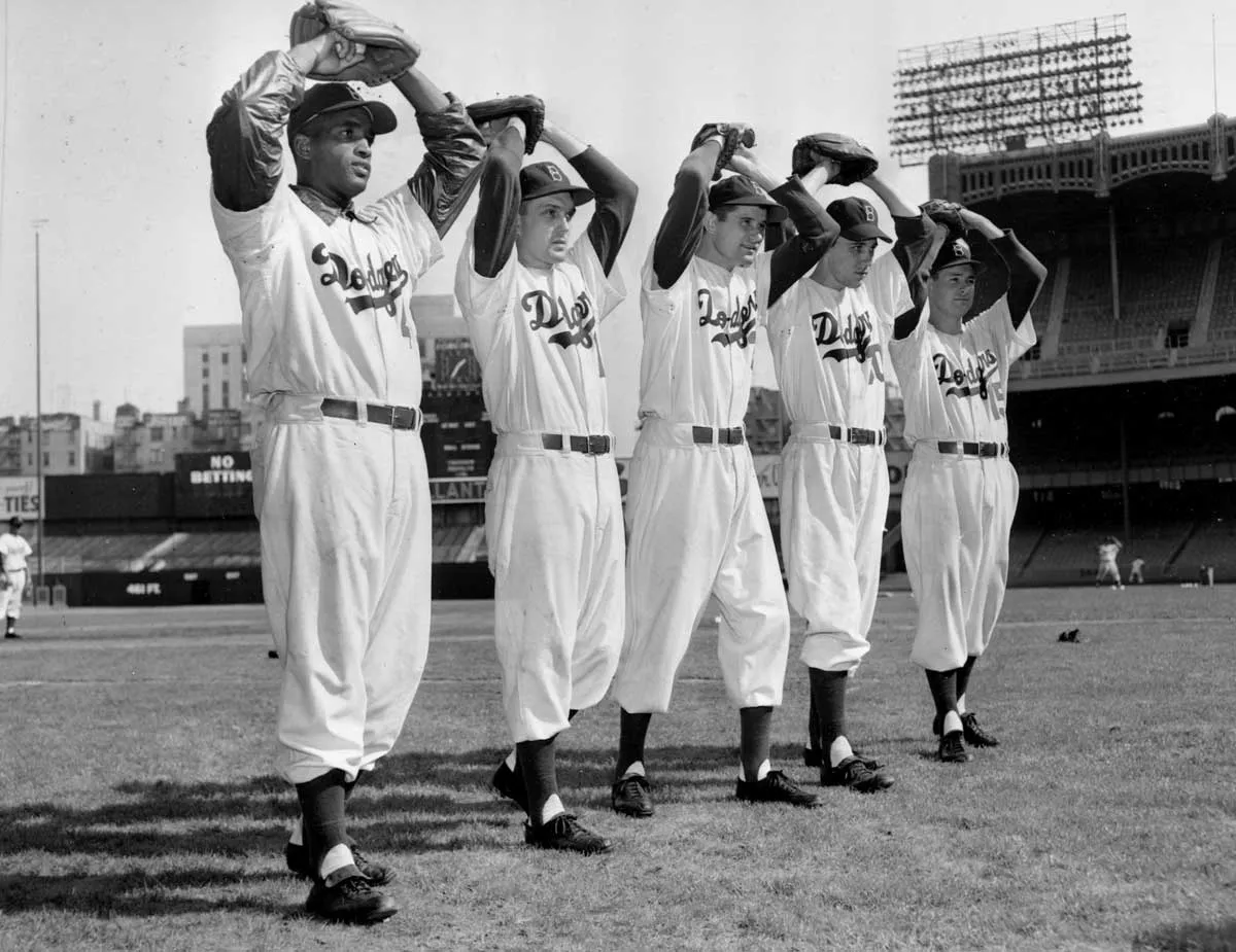 Image: The Brooklyn Dodgers moundsmen line-up for the upcoming world series during warm-up at Yankee Stadium, in the Bronx section of New York, on September 30, 1952. From left: Joe Black, Carl Erskine, Preacher Roe, Billy Loes, and Johnny Rutherford.