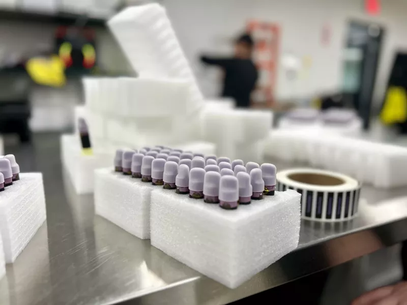 Wojo vapes are getting prepared to be shipped to dispensaries. - Steve Neavling